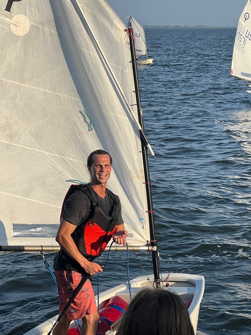 Competitor John Everitt sails with a smile.